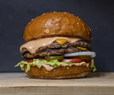 Fuudr double cheeseburger with melting cheddar on a toasted bun